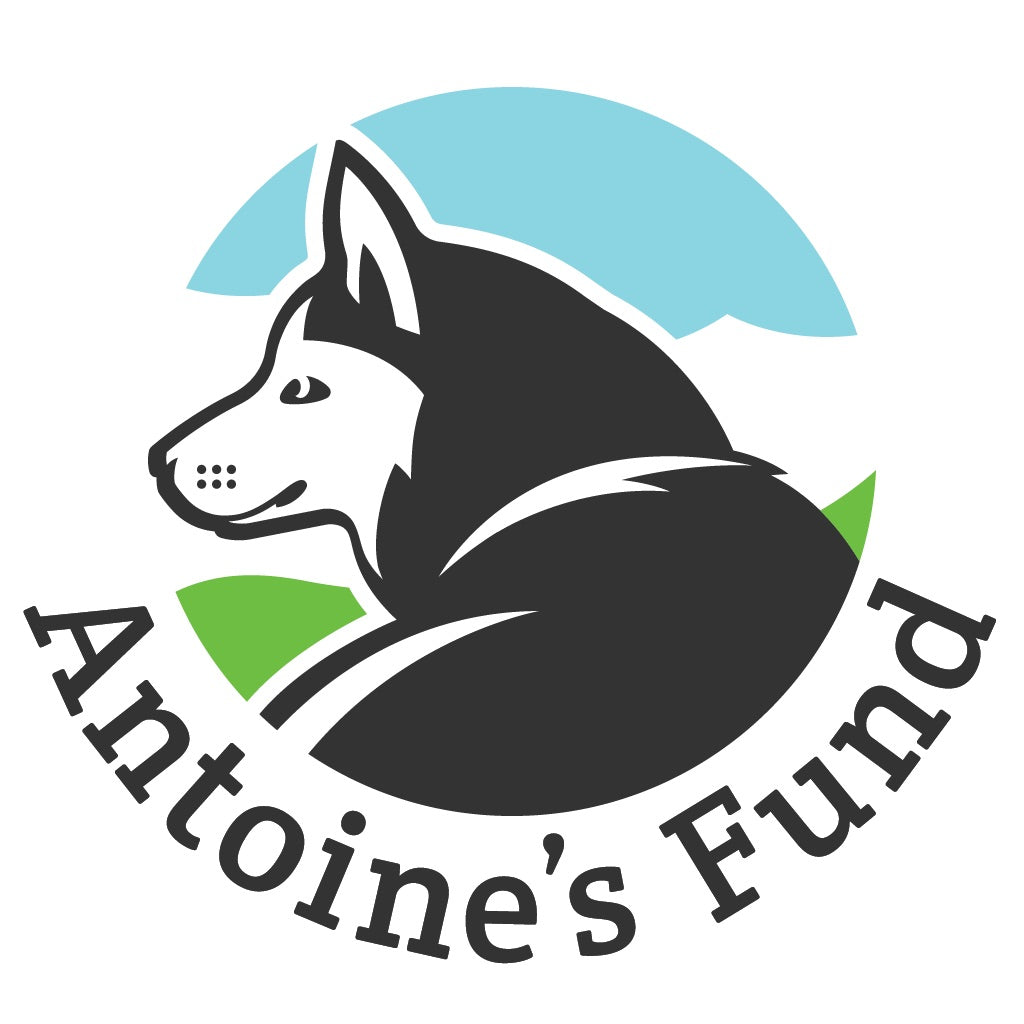 Antoine's fund logo. Husky in front of blue and green circle.